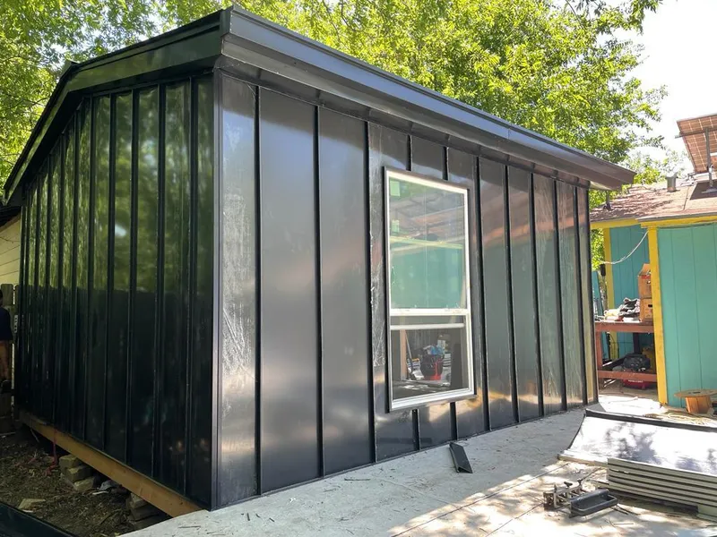 Black standing seam metal wall panels for Metal Roof Installation in West Hattiesburg