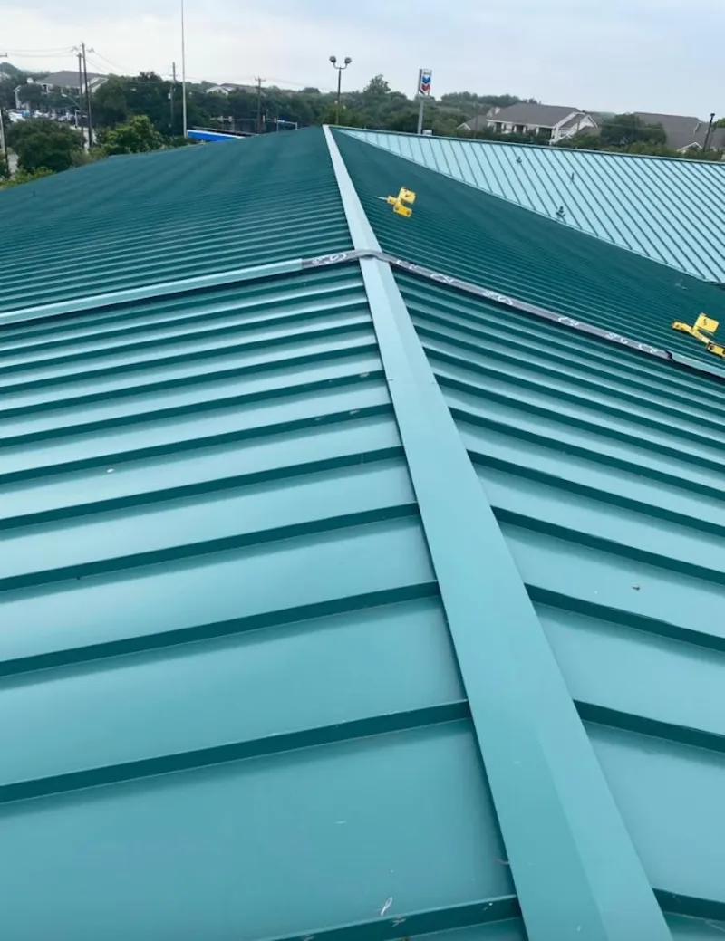 Green commercial metal roof ridge and valley for Metal Roof Repair in West Hattiesburg